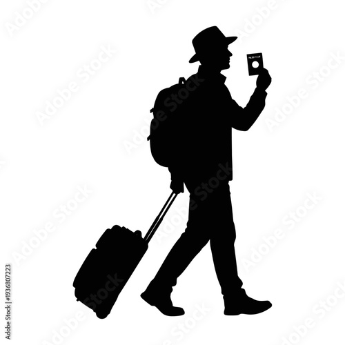 A silhouette of a man walking with a suitcase and phone