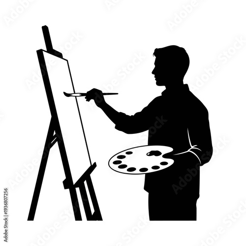 A silhouette of a man painting on an easel with a palette