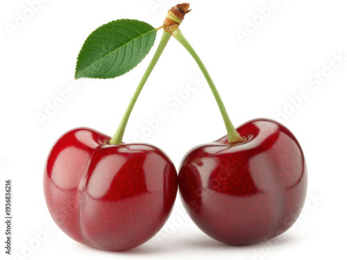 Two red cherries with green stem fruit leaf