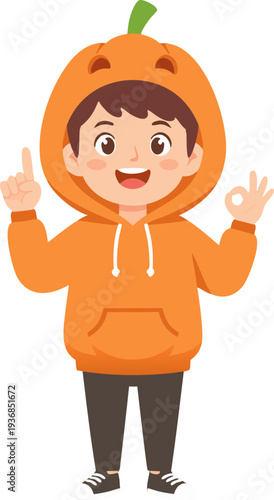 Happy Cartoon Boy Wearing a Pumpkin Hoodie Halloween Costume Making OK Sign and Pointing Up