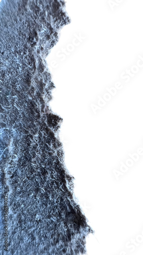 Wavy blue fabric edge texture isolated on a transparent background