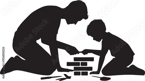 Father and child building toy brick wall together kneeling on floor
