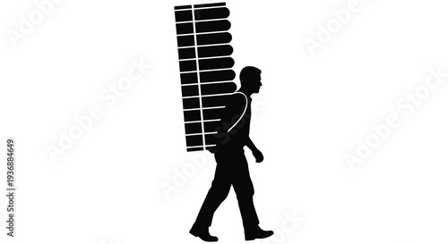 Silhouette of a man walking and carrying a large stack of plates on his back