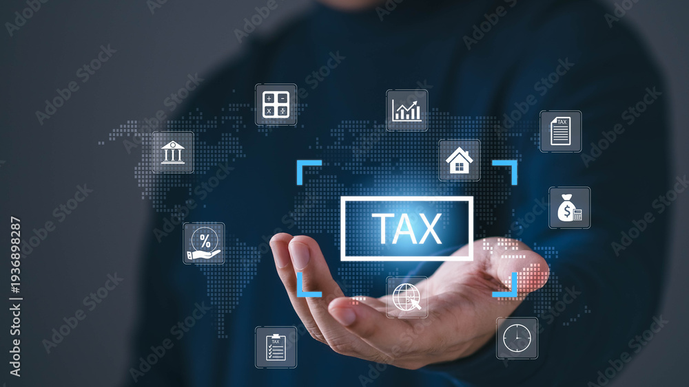 Fototapeta premium Business hand holding virtual TAX interface with financial icons and global map, representing tax planning, compliance, accounting services, corporate finance, international taxation concept.