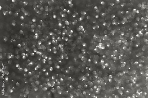 Abstract monochrome background featuring blurred circular light spots of varying sizes, creating bokeh effect. Demonstrating color of 2026 year, Cloud, Dancer