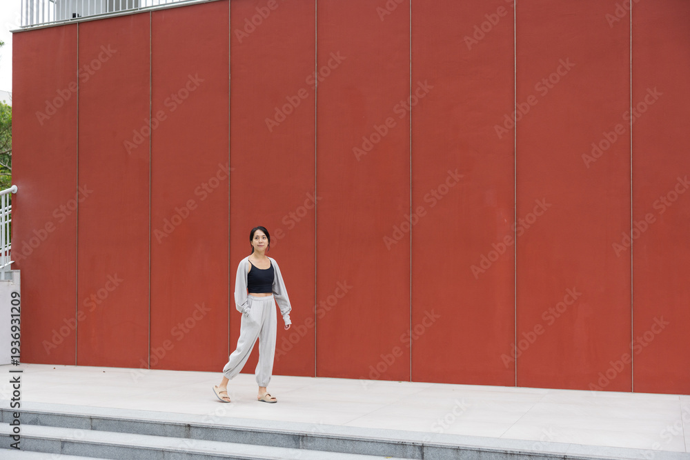 © leungchopan - Casual woman enjoy walking outdoors in city © leungchopan - Casual woman enjoy walking outdoors in city