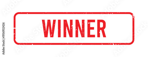 Red rubber stamp with the word winner inside a rectangle.