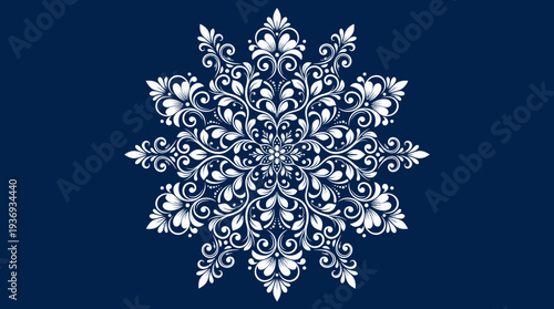 Ornate white mandala floral pattern on a dark blue background, a decorative oriental design for meditation or spiritual decor.