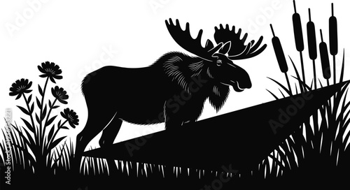 Black silhouette of a large bull moose with majestic antlers standing in a marshy wetland landscape with cattails, wildflowers, and grassy pond shore.