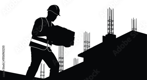 A construction worker carries bricks on a rooftop at a building site presented as a striking silhouette high quality