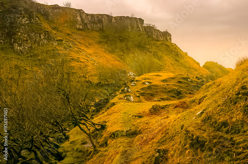 The hilltop Castle Ewan and stone circles at the Fairy Glen on the Isle of Skye, Scotland.