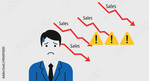 Sad business person under stress due to declining sales indicated by a downward graph and warning signs in a bright studio with a grey background.