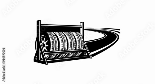 Tires neatly stacked on a rack beside a winding road