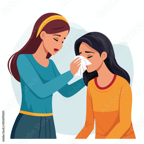 Woman comforting another offering tissue in supportive moment