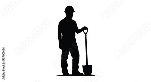 Silhouette of a construction worker holding a shovel isolated on white