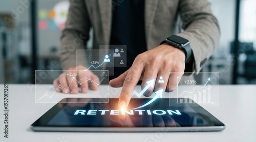 A businessman touching tablet with a focus on retention and business growth concept.