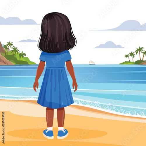 Young girl stands on beach watching ocean