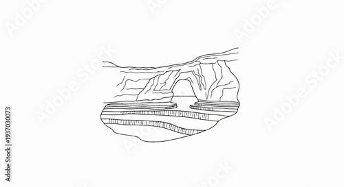 Archway formation in layered rock by the sea