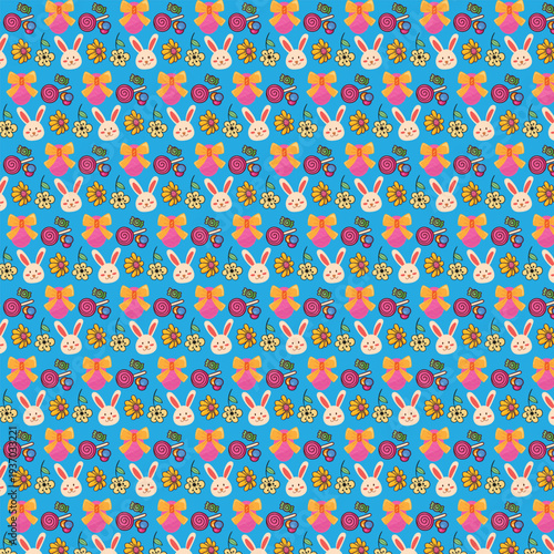 Colorful easter bunny face and candy seamless pattern on blue background