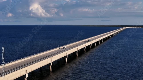 Wallpaper Mural Rodanthe Bridge commonly called the Jug Handle Bridge Extends Over Calm Ocean Water Toward Horizon over the southern point of Pea Island Under Clear Skies Torontodigital.ca