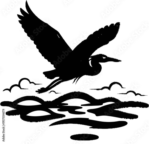 Silhouette of a heron in flight over rippling water and marsh grass