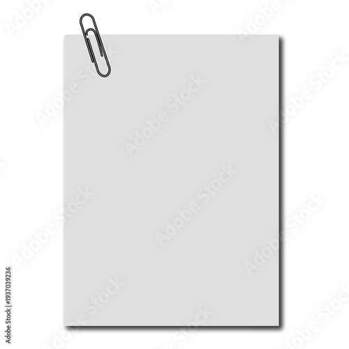 A blank piece of paper with a paperclip on top