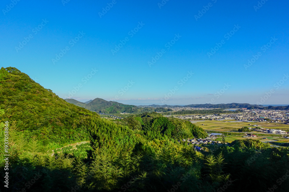 Obraz premium Mountain View Over Rural Valley and Rice Fields in Shikoku Japan