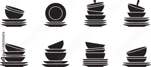Black and white of stacked dishes and bowls with food plates