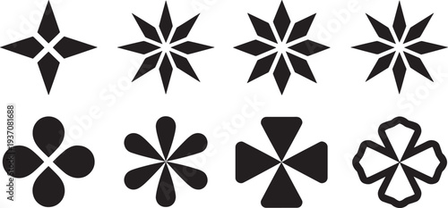 Black starburst shapes on white background abstract