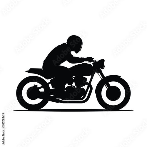 Silhouette of a motorcyclist riding a classic cafe racer motorcycle