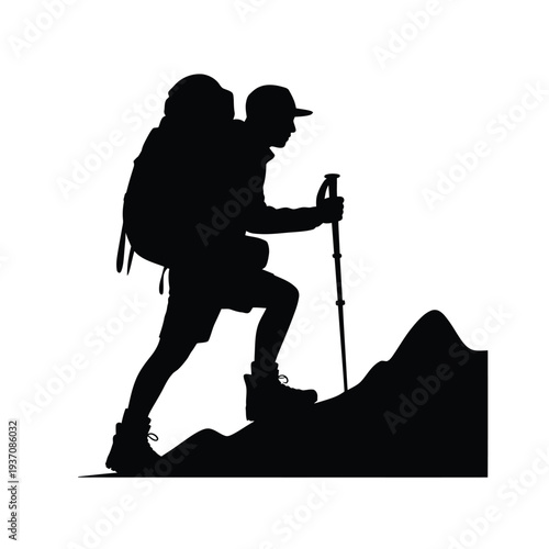 Silhouette of a hiker ascending a mountain with trekking poles