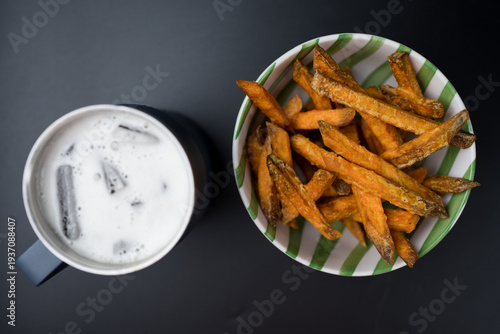 Wallpaper Mural Golden sweet potato fries swerve with cool beer. Top view Torontodigital.ca