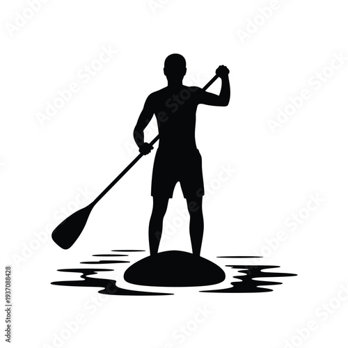 Silhouette of a paddleboarder standing on water with an oar