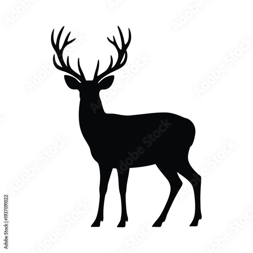Silhouette of a majestic stag with large branching antlers