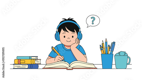 Young boy wearing headphones sits at a desk while focused on studying from an open book with school supplies and stationery nearby.