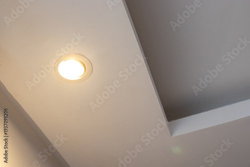 Obraz na płótnie Detail of recessed ceiling lighting with LED spotlights lit in a residential interior