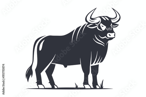 Powerful dark bull with striking horns confidently stands upon grassy ground, creating a strong visual