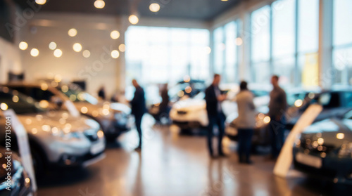 Defocused image of a modern automotive showroom with large windows