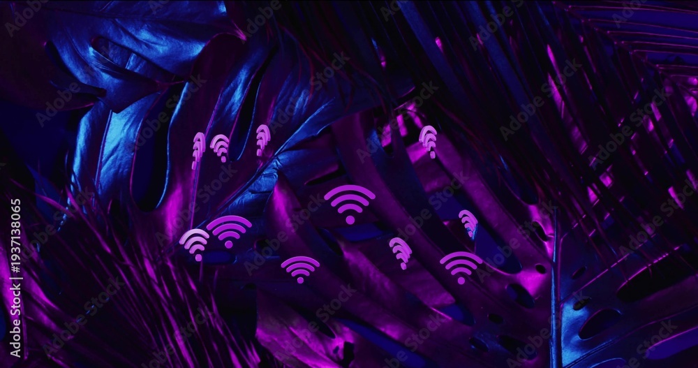 Fototapeta premium Glowing tropical leaves bathing in magenta and indigo neon light in studio, showing Wi-Fi icons