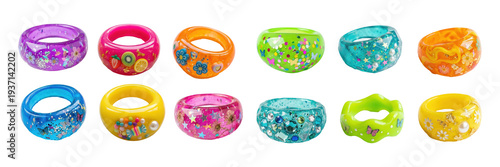 Playful resin palette, chunky colorful rings collection with embedded flowers, fruit slices and glitter, whimsical fashion aesthetic