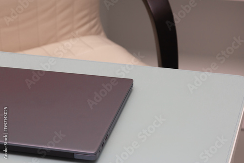 laptop and desktop in the office close-up. The end of the working day. Layoffs, job cuts