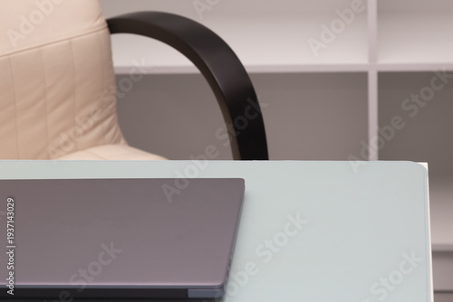 laptop and desktop in the office close-up. The end of the working day. Layoffs, job cuts