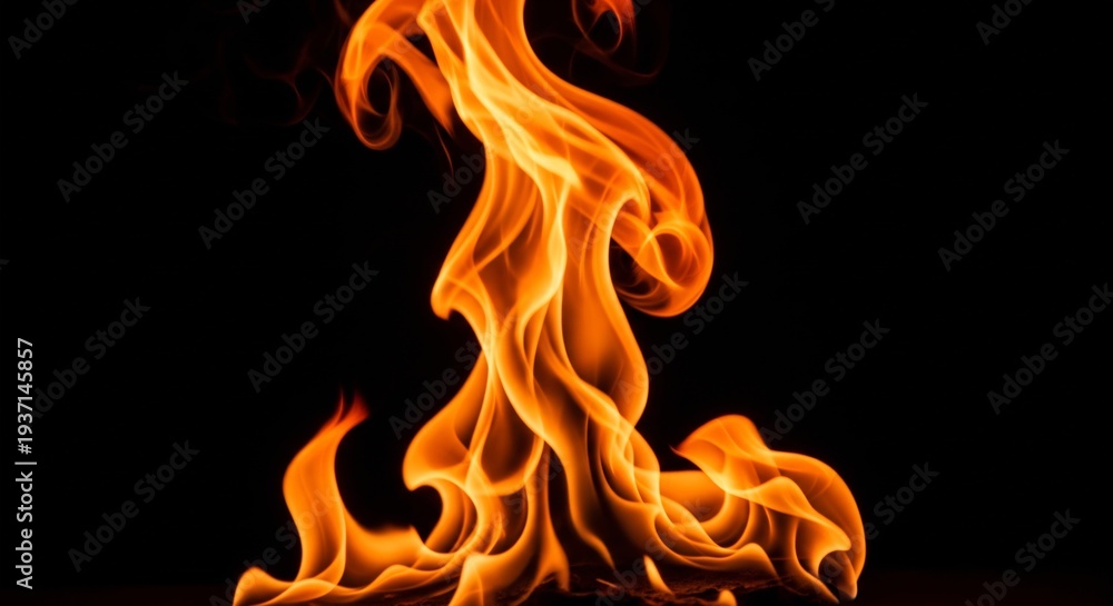 Fototapeta premium Vibrant orange flames dancing against a dark background