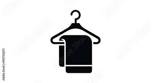 Black hanger with folded clothes a simple and minimalist silhouette