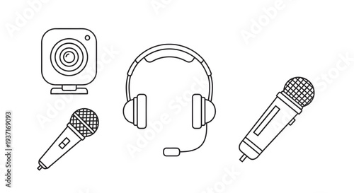 Recording studio equipment including microphones, headphones, and camera, ready for a podcast or live streaming session.