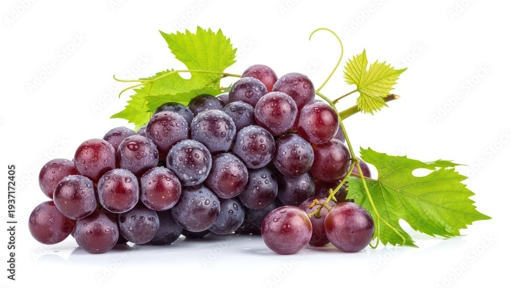 Fototapeta premium Fresh red grapes with green leaves isolated on white background