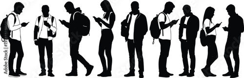 Group Of Young People Silhouettes Standing And Looking At Their Smartphones teenagers