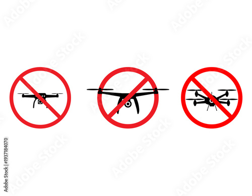 Three black drone silhouettes with red prohibition signs indicating no-fly zones or restricted drone usage on a white background.
