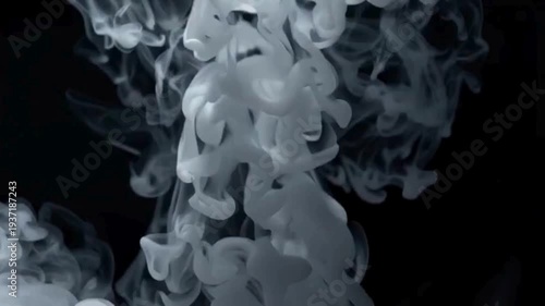 Mysterious smoke swirling in darkness with eerie ambiance