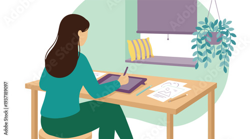 Creative woman drawing on a graphics tablet in a home office setting